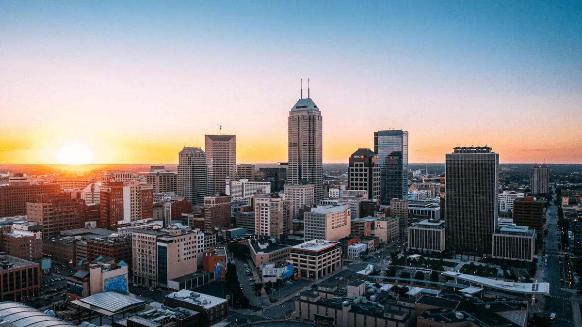 Indianapolis Indiana downtown skyline with Soldiers and Sailors Monument and modern skyscrapers at golden hour